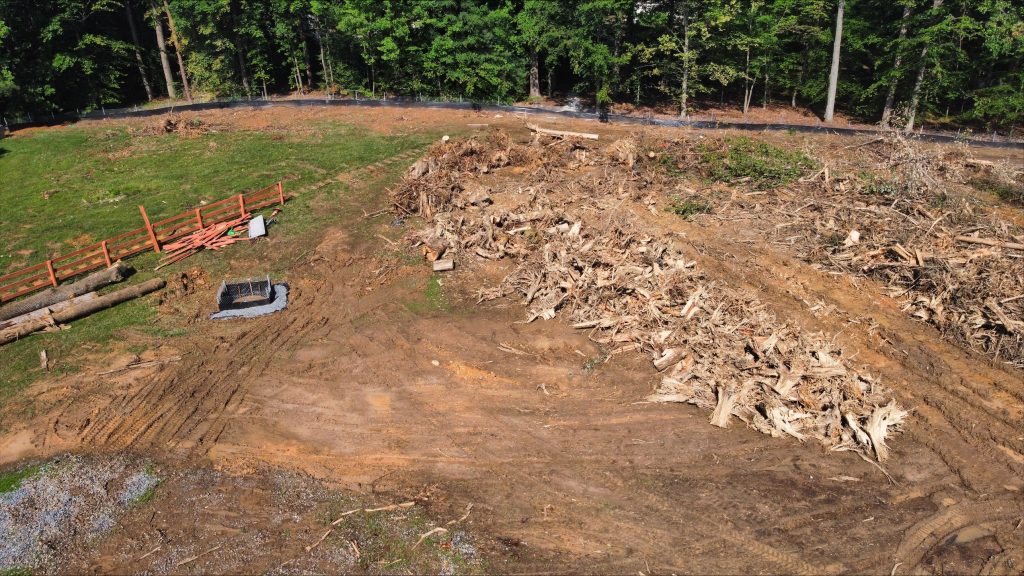 Excavation and grading progress on the Phase 1 parking lot site in June 2026